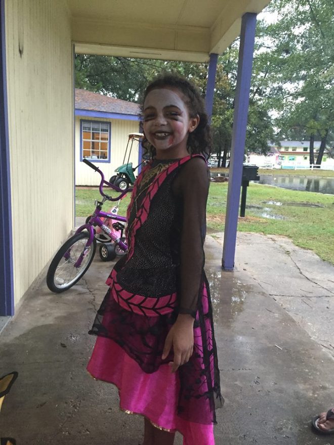 Prepping for Halloween night.  My granddaughter, Halfa'-Pint.